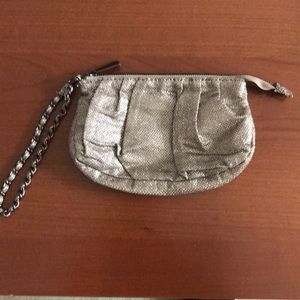 Express sparkle bag wristlet. Zips close.
